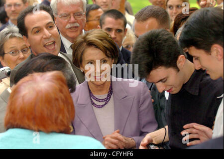 House Speaker Nancy Pelosi (center) is surrounded by visitors after speaking at Rep. George Miller's annual birthday fund raiser in Pleasant Hill, Calif. on Saturday, May 19, 2007.  (Dean Coppola/Contra Costa Times) Stock Photo
