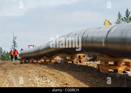 Construction of oil pipeline East Siberia - Pacific Ocean.The ambitious East Siberia-Pacific Ocean oil pipeline, managed by state-run oil pipe operator Transneft, is slated to pump up to 1.6 million barrels per day of crude from Siberia to Russia`s Far East, which will then be sent on to China and t Stock Photo