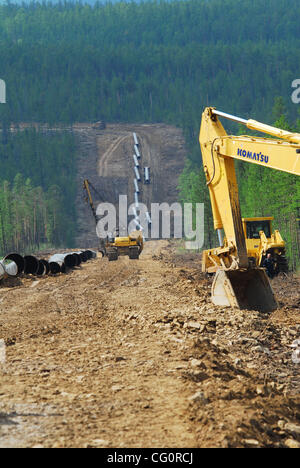 Construction of oil pipeline East Siberia - Pacific Ocean.The ambitious East Siberia-Pacific Ocean oil pipeline, managed by state-run oil pipe operator Transneft, is slated to pump up to 1.6 million barrels per day of crude from Siberia to Russia`s Far East, which will then be sent on to China and t Stock Photo