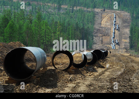 Construction of oil pipeline East Siberia - Pacific Ocean.The ambitious East Siberia-Pacific Ocean oil pipeline, managed by state-run oil pipe operator Transneft, is slated to pump up to 1.6 million barrels per day of crude from Siberia to Russia`s Far East, which will then be sent on to China and t Stock Photo