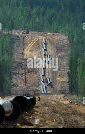 Construction of oil pipeline East Siberia - Pacific Ocean.The ambitious East Siberia-Pacific Ocean oil pipeline, managed by state-run oil pipe operator Transneft, is slated to pump up to 1.6 million barrels per day of crude from Siberia to Russia`s Far East, which will then be sent on to China and t Stock Photo