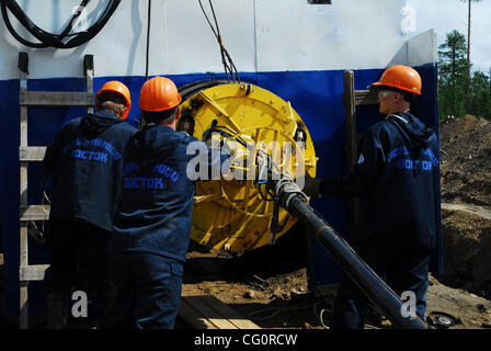 Construction of oil pipeline East Siberia - Pacific Ocean.The ambitious East Siberia-Pacific Ocean oil pipeline, managed by state-run oil pipe operator Transneft, is slated to pump up to 1.6 million barrels per day of crude from Siberia to Russia`s Far East, which will then be sent on to China and t Stock Photo