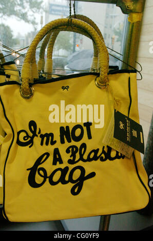 A rack of 'I'm Not A Plastic Bag' totes. Thousands line up for Whole Foods Market launch of 'I'm Not A Plastic Bag' shopping totes designed by Anya Hindmarch at select Whole Foods Markets in New York City. Designer Anya Hindmarch is on location at the Whole Foods Market Bowery for the New York City  Stock Photo