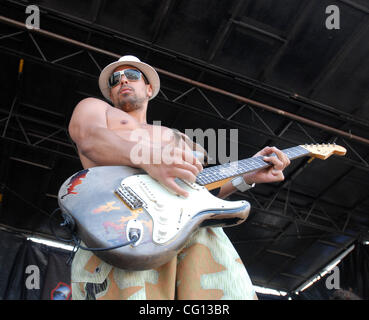 Jul. 23, 2007; Charlotte, NC USA; Guitarist KALEO WASMAN of the band Pepper performs live as part of the 13th annual Vans Warped Tour that took place at the Verizon Wireless Amphitheater located in Charlotte. Mandatory Credit: Photo by Jason Moore (©) Copyright 2007 by Jason Moore Stock Photo