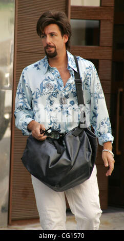 Jul 25, 2007 - New York, NY, USA - Actor ADAM SANDLER films his new movie 'You Don't Mess with the Zohan' outside of the Paul Mitchell hair studio located on Fifth Avenue.  (Credit Image: © Nancy Kaszerman/ZUMA Press) Stock Photo