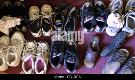 Buffalo, MN  6/17/20003 Shoes lined up near the front door of the Durst home in Buffalo. (Credit Image: © Minneapolis Star Tribune/ZUMA Press) Stock Photo