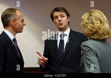 Oct. 21, 2011 - Brussels, BXL, Belgium - Luxembourg Ministers of Budget Luc Frieden (L) , French Finance minister, Francois Baroin   (C) and  Spanish finance Minister Elena Salgado during a meeting of eurozone finance ministers in  Brussels, Belgium on 2011-10-21  The chairman of the eurogroup of fi Stock Photo