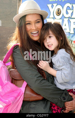 Tia Carrere & daughter arrives at the Los Angeles Premiere of 'Yogi Bear' held at the Mann Village Theater. Los Angeles, California - 11.12.10 Stock Photo