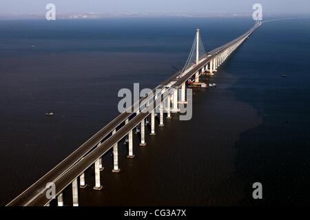 Longest Sea Bridge The Qingdao Haiwan Bridge was completed in Qingdao, Jiaozhou Bay, China on 27 December 27 2010, making it the longest cross sea bridge. The bridge links the main urban area of Qingdao city in East China’s Shandong province with the Huan Stock Photo