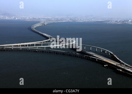 Longest Sea Bridge The Qingdao Haiwan Bridge was completed in Qingdao, Jiaozhou Bay, China on 27 December 27 2010, making it the longest cross sea bridge. The bridge links the main urban area of Qingdao city in East China’s Shandong province with the Huan Stock Photo