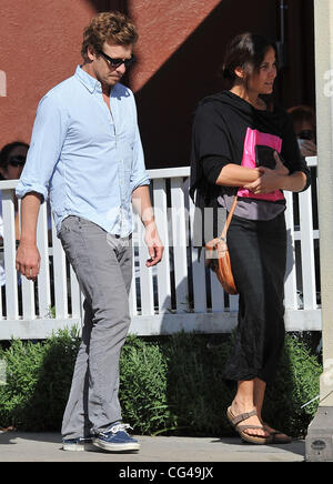 The Mentalist' actor, Simon Baker and his wife Rebecca Rigg are seen at Brentwood Country Mart. Brentwood, California - 26.01.11 Stock Photo