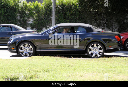 Melanie Griffith seen smoking and chatting on the phone while out driving in Beverly Hills. Los Angeles, California - 24.09.10 Stock Photo