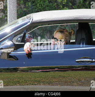 Melanie Griffith seen smoking and chatting on the phone while out driving in Beverly Hills. Los Angeles, California - 24.09.10 Stock Photo