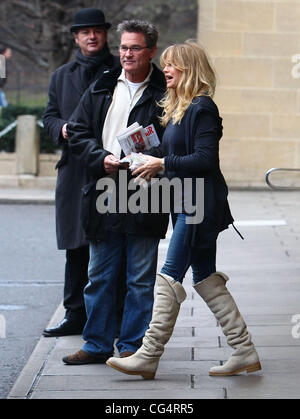 Goldie Hawn and Kurt Russell prepare to leave their hotel in London London, England - 29.01.11 Stock Photo