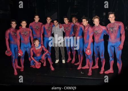 New York, USA. August 23, 2012. SPIDER-MAN turn off the dark welcomes Olympian Danell Leyva (C) to The Foxwoods Theater. Stock Photo
