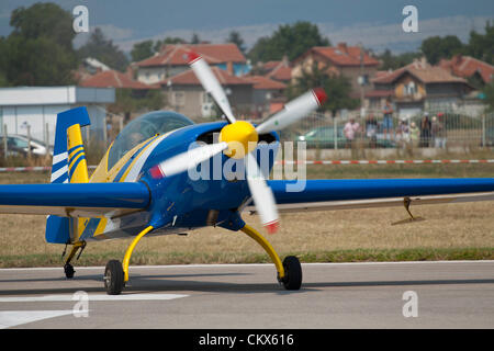 Lesnovo, Bulgaria; 24th Aug 2012. An Extra 300 aerobatics aircraft turning on the runway to get into starting position. Credit:  Johann Brandstatter / Alamy Live News Stock Photo