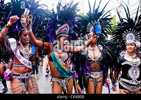 London, UK - 27 August 2012: revellers take part in the parade during the annual Notting Hill Carnival. Credit:  pcruciatti / Alamy Live News. Stock Photo