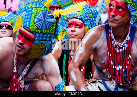 London, UK - 27 August 2012: revellers join the parade during the annual Notting Hill Carnival. Credit:  pcruciatti / Alamy Live News. Stock Photo