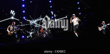 From left: bass guitarist Michael Balzary, drummer Chad Smith, singer Anthony Kiedis and guitarist Josh Klinghoffer of Red Hot Chilli Peppers perform live during concert in Prague, Czech Republic on August 27, 2012. (CTK Photo/Stanislav Peska) Stock Photo