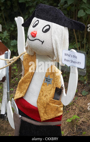 27 August 2012. Bisterne, New Forest National Park, Hampshire, UK. Bisterne Scarecrow Festival 2012. Who's this then sherriff? Deputy Dawg. Credit:  Carolyn Jenkins / Alamy Live News Stock Photo