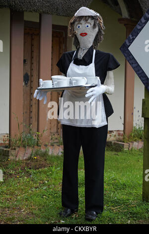 27 August 2012. Bisterne, New Forest National Park, Hampshire, UK. Bisterne Scarecrow Festival 2012. Tea lady. Credit:  Carolyn Jenkins / Alamy Live News Stock Photo