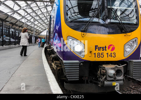 August 28, 2012. A First Trans Pennine Express train at Liverpool Lime Street railway station in Liverpool, England on Tuesday, . The Transport Secretary announced today that the West Coast mainline franchise contract was expected to be signed by winning train operator First Group on Wednesday, August 29, 2012. It was announced on Wednesday, August 15, 2012 that First Group had won its bid to run the West Coast mainline franchise, outbidding the current operator Virgin Trains who have run the franchise for the past 15 years. Stock Photo