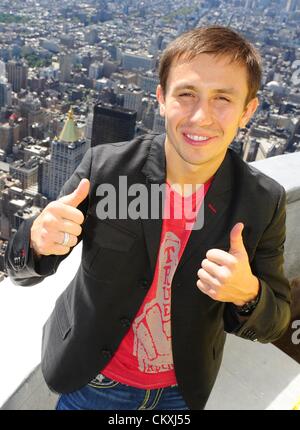 Aug. 29, 2012 - Manhattan, New York, U.S. - GENNADY GOLOVKIN (23-0, 20 KOs), undefeated professional boxer and Olympic silver medalist (2004) tours the Empire State Building's 103rd floor parapet to promote his US debut September 1 in the main event of a ''Boxing After Dark'' doubleheader on HBO at Turning Stone Casino in Verona, N.Y. A native of Kazakhstan, Golovkin is based in Stuttgart, Germany and trains in Big Bear, Calif. (Credit Image: © Bryan Smith/ZUMAPRESS.com) Stock Photo