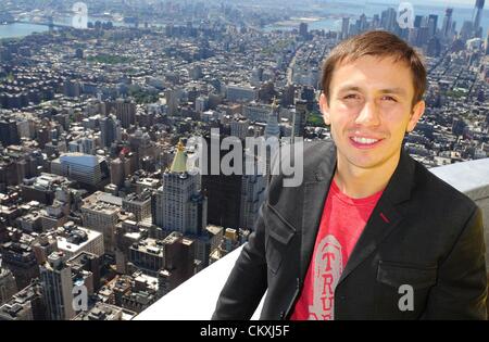 Aug. 29, 2012 - Manhattan, New York, U.S. - GENNADY GOLOVKIN (23-0, 20 KOs), undefeated professional boxer and Olympic silver medalist (2004) tours the Empire State Building's 103rd floor parapet to promote his US debut September 1 in the main event of a ''Boxing After Dark'' doubleheader on HBO at Turning Stone Casino in Verona, N.Y. A native of Kazakhstan, Golovkin is based in Stuttgart, Germany and trains in Big Bear, Calif. (Credit Image: © Bryan Smith/ZUMAPRESS.com) Stock Photo
