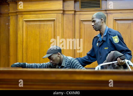 Cape Town, South Africa. 30th Aug 2012. Xolile Mngeni appears in the Cape Town High Court, on August 30, 2012 in Cape Town, South Africa. He is accused of being involved in the murder on Anni Dewani, whose British husband Shrien Dewani allegedly plotted her murder while on honeymoon in South Africa. (Photo by Gallo Images / Foto24 / Yunus Mohamed/ Alamy Live News) Stock Photo