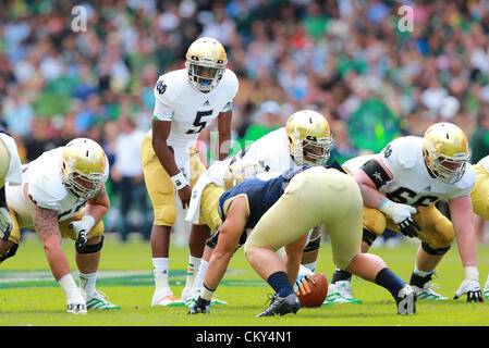 01.09.2012 Dublin, Ireland.  Notre Dame Fighting Irish quarterback Everett Golson #5 prepares for the snap during the American Football game between Notre Dame and Navy from the Aviva Stadium. Stock Photo