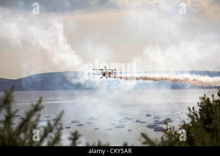 Bournemouth, UK Friday 31 August 2012. Breitling wingwalkers wing walkers performing at the Bournemouth Air Festival, Bournemouth, UK. The Breitling wingwalkers  have since become the AeroSuperBatics Wingwalkers. Credit:  Carolyn Jenkins / Alamy Live News Stock Photo