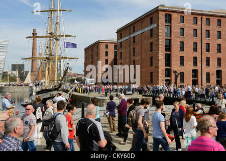 Saturday 1st September 2012. Liverpool, UK. The Irish Sea 2012 Tall Ships Regatta. Crowds view the Tall Ships at The Albert Dock, Liverpool. Stock Photo
