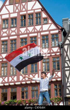 Saturday 1st September 2012. Pro-Assad demonstrators protest against against civil war in Syria and against outside involvement by the US and UN in historic Römerberg square in central Frankfurt, Germany. Stock Photo