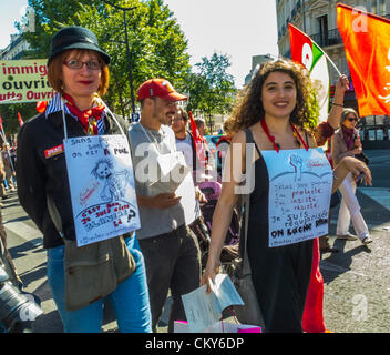 Paris, France, French Woman Marching with Immigrants Without Documents , Sans Papiers, in Public Demonstration, trans rights protest, youth activist lgbt Stock Photo