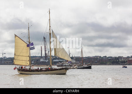 The inaugural Irish Sea Tall Ships Regatta in Liverpool comes to a close on Sunday September 2, 2012 as all fourteen Tall Ships took part in a Parade of Sail leaving Liverpool’s Albert Dock onto the River Mersey. The ships then mustered in formation and left the river together. Stock Photo