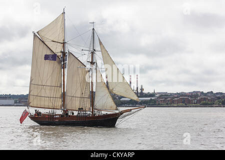 The inaugural Irish Sea Tall Ships Regatta in Liverpool comes to a close on Sunday September 2, 2012 as all fourteen Tall Ships took part in a Parade of Sail leaving Liverpool’s Albert Dock onto the River Mersey. The ships then mustered in formation and left the river together. Stock Photo