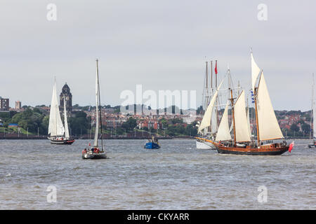 The inaugural Irish Sea Tall Ships Regatta in Liverpool comes to a close on Sunday September 2, 2012 as all fourteen Tall Ships took part in a Parade of Sail leaving Liverpool’s Albert Dock onto the River Mersey. The ships then mustered in formation and left the river together. Stock Photo