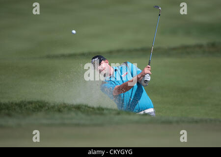 02.09.2012. Boston, USA.  Marc Leishman hits from the bunker on 14 during the Third Round of the Deutsche Bank Championship at TPC Boston, Norton, Massachusetts on September 2, 2012. Stock Photo