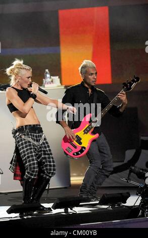 Gwen Stefani, Tony Kanal on stage for NFL Kickoff 2012 Concert, Rockefeller Plaza, New York, NY September 5, 2012. Photo By: Kristin Callahan/Everett Collection Stock Photo