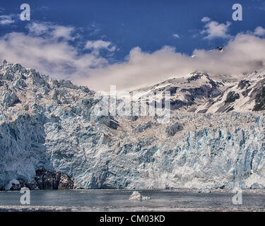 July 1, 2012 - Kenai Peninsula Borough, Alaska, US - Close-ups of the front face of impressive, awe-inspiring, Aialik Glacier, rising some 300 to 400 feet from sea level. At the North end of Aialik Bay off the Gulf of Alaska it is the largest tidewater glacier of Kenai Fjords National Park, its source in the vast Harding Icefield in the Kenai Mountains. Established in 1980, the National Park covers 1,760 square miles of the Kenai Peninsula. (Credit Image: © Arnold Drapkin/ZUMAPRESS.com) Stock Photo