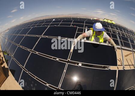 Aug. 21, 2012 - Los Angeles, California (CA, United States - Workers install the solar panels at AV Solar Ranch One, outside of Lancaster. (Credit Image: © Ringo Chiu/ZUMAPRESS.com) Stock Photo