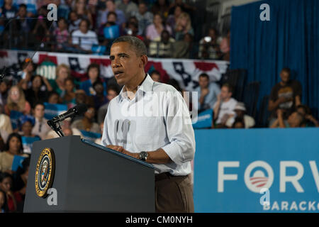 Kissimmee, Florida, USA. September 8. 2012-Animated by the Democratic National Convention, US President Barack Obama campaigns to ethnically diverse crowd of about 3000 people in I-4 corridor of Florida. President Obama promised to increase energy independence and dismissed tax cuts proposed by Republicans as 'the same worn-out plan that they've had for 30 years.' Greater Orlando is home to over 860,000 Puerto Ricans. The Latino vote is crucial in this presidential election. Stock Photo