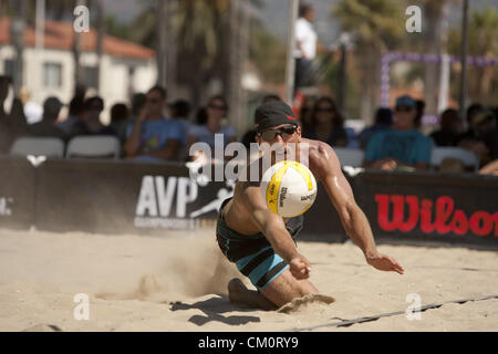 Sept. 7, 2012 - Santa Barbara, CA, USA - Santa Barbara, CA - September 7th, 2012 - Sean Rosenthall playing with partner Jake Gibb, dives for a ball from opponents Braidy Halverson/Ty Loomis in the AVP Beach Championships beach volleyball tournament held in West Beach, Santa Barbara, CA. It is the second tournament put on by the newly reformed AVP, after they had to shut their doors more than 2 years ago. Gibb/Rosenthall won the match 21-12, 21-16. Photo by Wally Nell/Zuma (Credit Image: © Wally Nell/ZUMAPRESS.com) Stock Photo