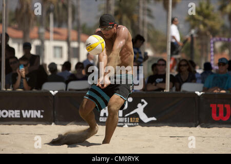 Sept. 7, 2012 - Santa Barbara, CA, USA - Santa Barbara, CA - September 7th, 2012 - Sean Rosenthall playing with partner Jake Gibb, passes a ball from opponents Braidy Halverson/Ty Loomis in the AVP Beach Championships beach volleyball tournament held in West Beach, Santa Barbara, CA. It is the second tournament put on by the newly reformed AVP, after they had to shut their doors more than 2 years ago. Gibb/Rosenthall won the match 21-12, 21-16. Photo by Wally Nell/Zuma (Credit Image: © Wally Nell/ZUMAPRESS.com) Stock Photo