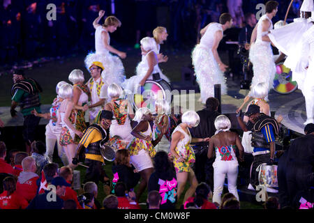 Performers dance onstage at Olympic Stadium during the closing ceremony of the 2012 London Paralympic Games. Stock Photo