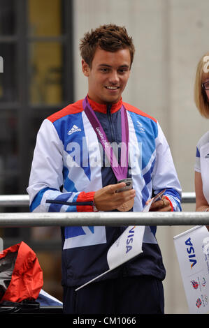 London, UK, Monday 10th September 2012. Diving's Tom Daley celebrates TeamGB's success on a procession of floats through central London, as part of the London 2012 Team GB Athletes Victory Parade. Stock Photo