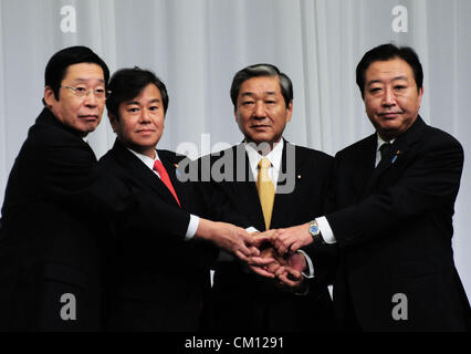 Sept. 11, 2012 - Tokyo, Japan - Japanese Prime Minister YOSHIHIKO NODA (R), shakes hands with  with former Agriculture, Forestry and Fisheries Minister MICHIHIKO KANO (L), left, former Internal Affairs and Communications Minister KAZUHIRO HARAGUCHI (2nd L), and former Agriculture, Forestry and Fisheries Minister HIROTAKE AKAMATSU (2nd R) during a joint press conference by candidates of presidential election of Japan's ruling Democratic Party of Japan on Monday, September 10, 2012 in Tokyo, Japan. (Credit Image: © Hajime Takashi/Jana Press/ZUMAPRESS.com) Stock Photo