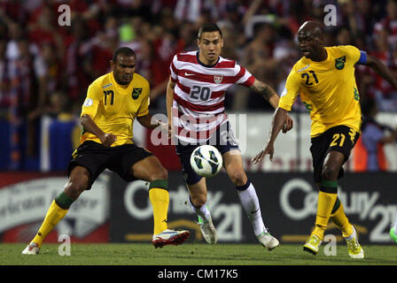 11.09.2012. Columbus, Ohio, USA.  Geoff Cameron (USA) (20) defends against Luton Shelton (JAM) (21) and Rodolph Austin (JAM) (17). The United States Men's National Team defeated the Jamaica Men's National Team 1-0 at Columbus Crew Stadium in Columbus, Ohio in a CONCACAF Third Round World Cup Qualifying match for the FIFA 2014 Brazil World Cup. Stock Photo