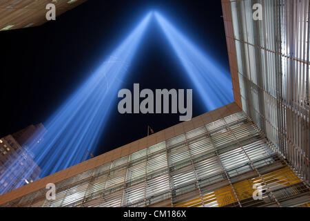 The twin beams of light of the Tribute in Light, an annual remembrance of the events of September 11, 2001, shine into the night sky in New York City. Stock Photo