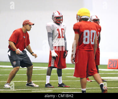 Sept. 12, 2012 - Albuquerque, NM, U.S. - UNM's  #10 Rashad Rainey listens as tight ends coach Derek Warehime talks to him as  they run through a play during practice Wed. afternoon. Wednesday, Sept.12, 2012. (Credit Image: © Jim Thompson/Albuquerque Journal/ZUMAPRESS.com) Stock Photo